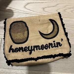 Island to east side sequin honeymoon pouch